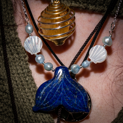 A finished necklace being worn